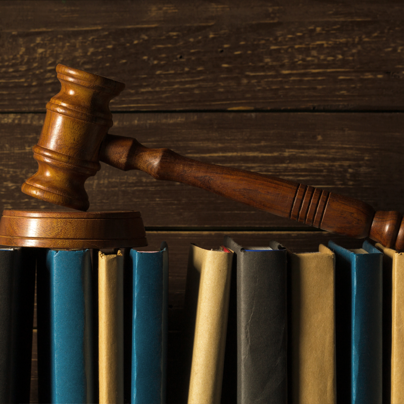 gavel-with-books-old-wooden-desk